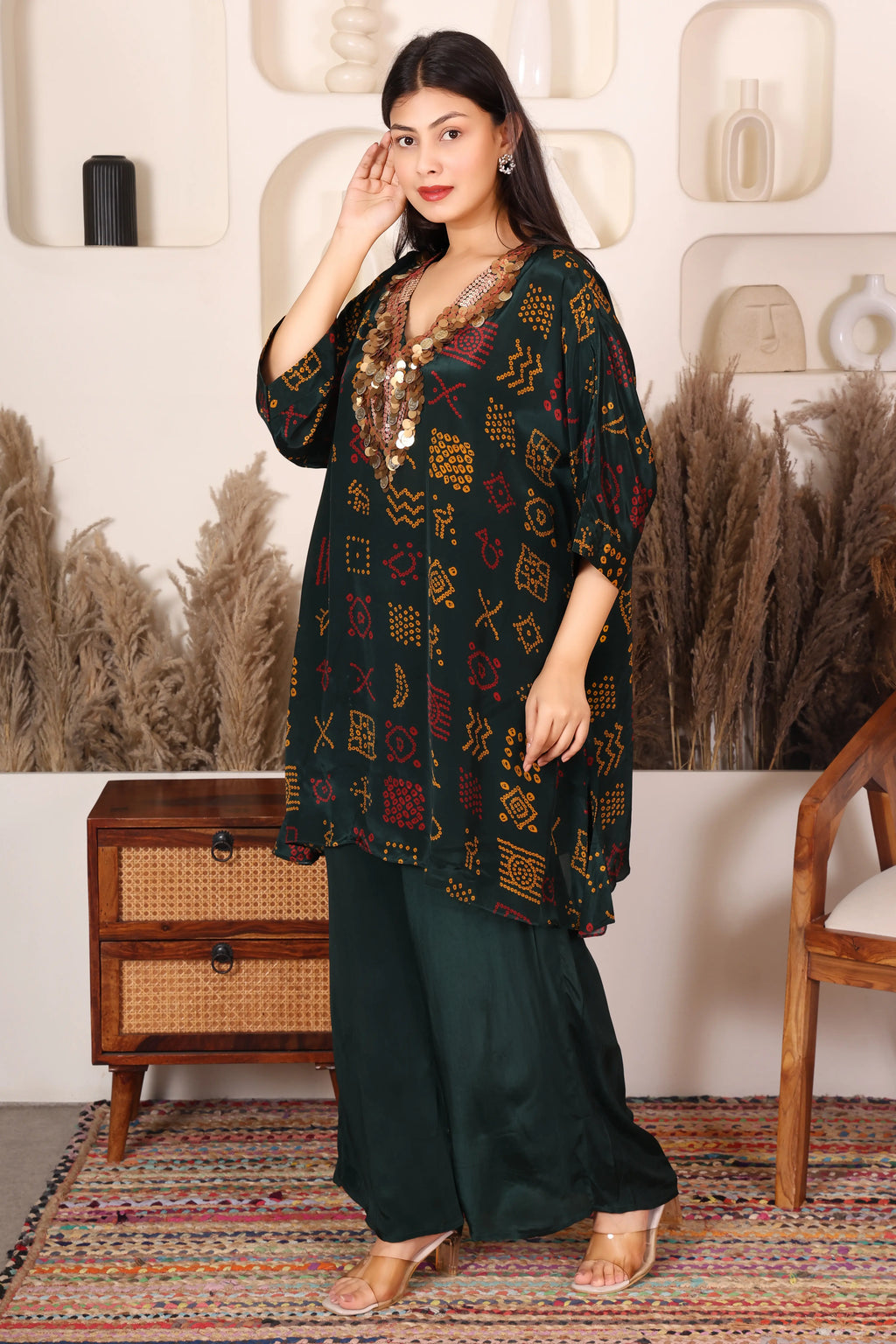 Woman wearing a dark green patterned Kaftan Coord Set