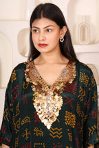 Woman wearing a dark green patterned Kaftan Coord Set