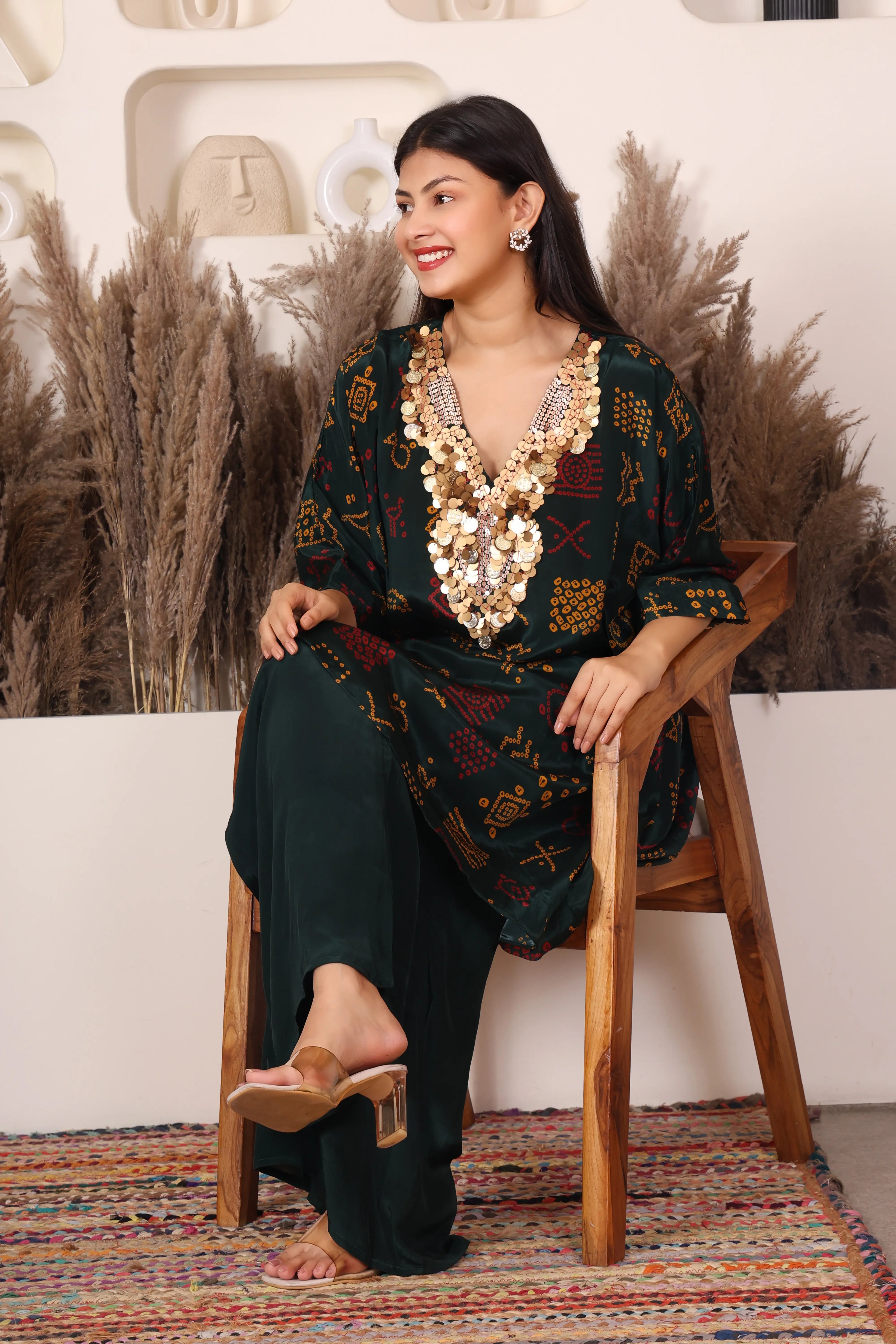 Woman wearing a dark green patterned Kaftan Coord Set