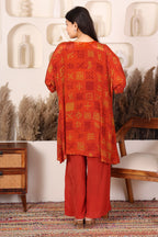 Woman in a red traditional outfit with gold Sequins patterns 