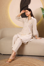 Off white embroidered kurta co-ord set for women with tassel detailing
