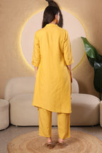 Woman wearing a yellow kurta with pants 