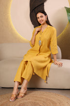 Woman wearing a yellow kurta with pants 