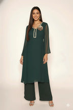 Elegant bottle green georgette kurti set with side pleats, sequin-detailed neckline, floral embellishment, shantoon lining, and crepe bell-bottom pants.