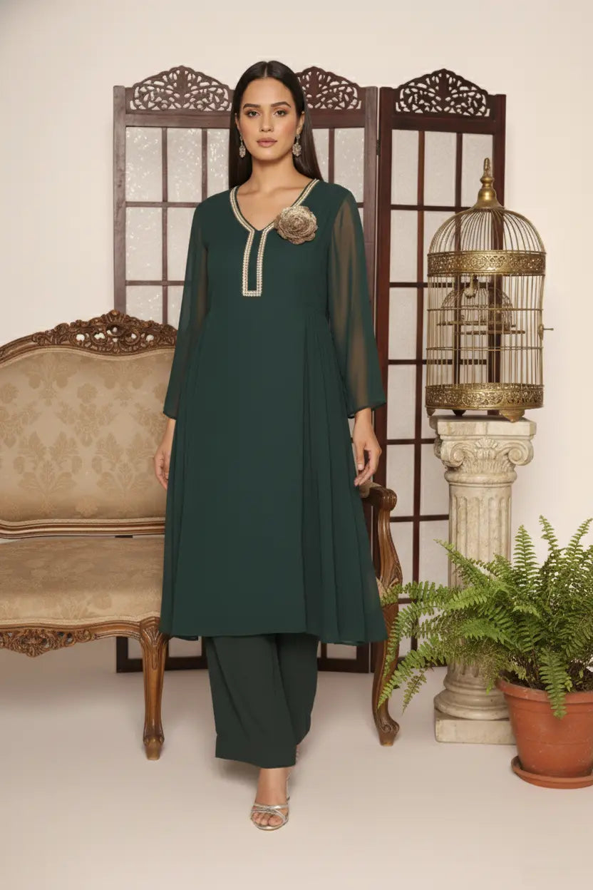 Elegant bottle green georgette kurti set with side pleats, sequin-detailed neckline, floral embellishment, shantoon lining, and crepe bell-bottom pants.